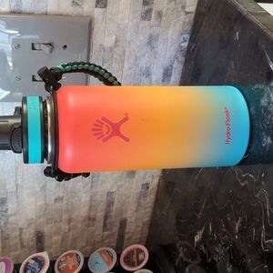 Hydro flask Hawaiian Colors. Blue, yellow, Pink. Boot and lid included.